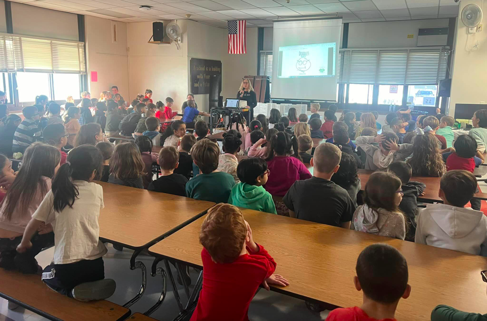 Realize Harmony Visits West End Elementary Lynbrook for Doodle Assembly 